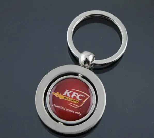Factory direct sales custom double-sided logo metal rotating keychain