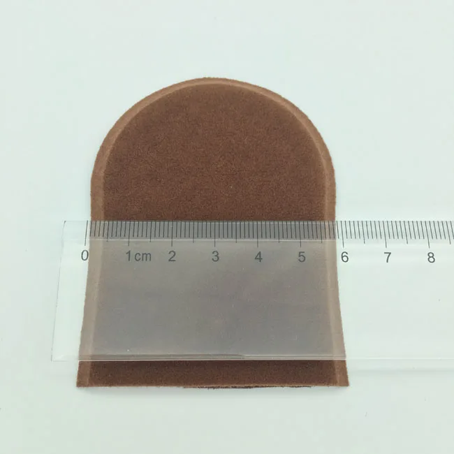 Small tan mitt for face