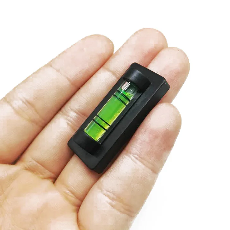Magnetic stripe mini bubble level