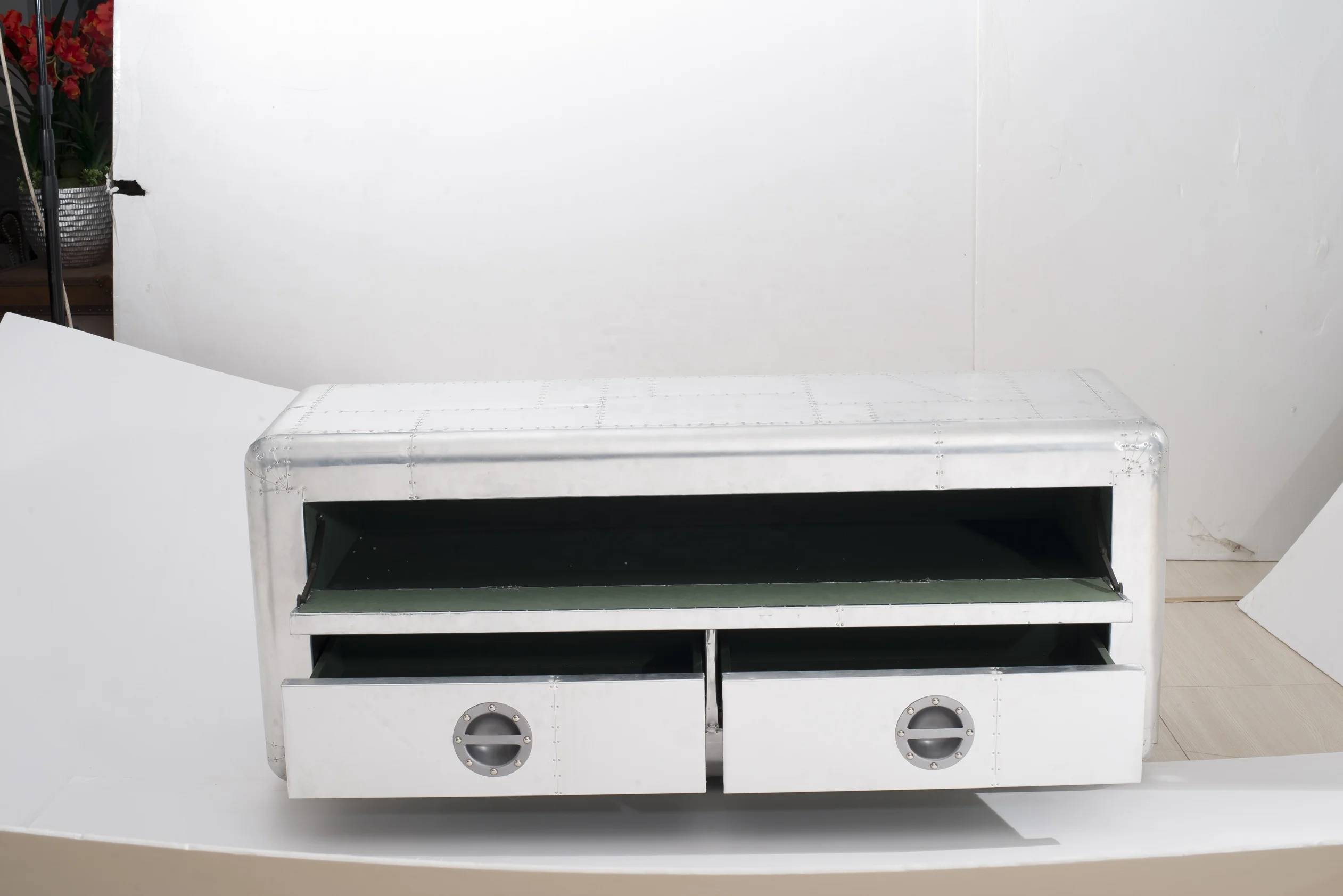 TV stand with aviator aluminum covering