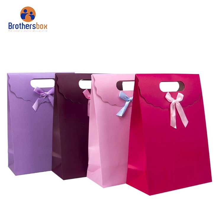 china supplier Accept Customised Logo Gift Carry Paper Shopping Bags kraft paper bag with handle