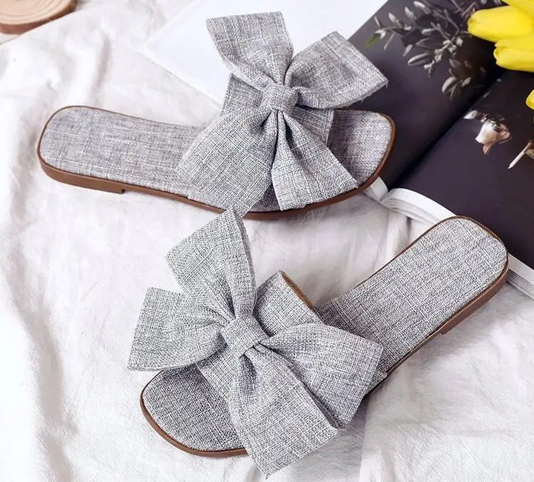 Classic bowknot design ladies indoor and outdoor comfortable soft rubber slippers