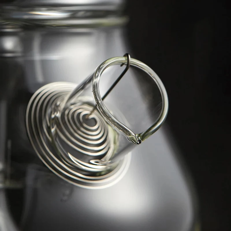 Heat resistant clear glass teapot to boil water