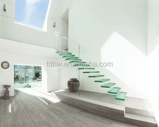 Floating tempered glass stairs with Laminated glass tread