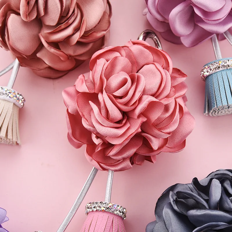 2021 Korean version of the hanging edge burning hot flower bag pendant jewelry female diamond PU tassel alloy key chain manufacturers