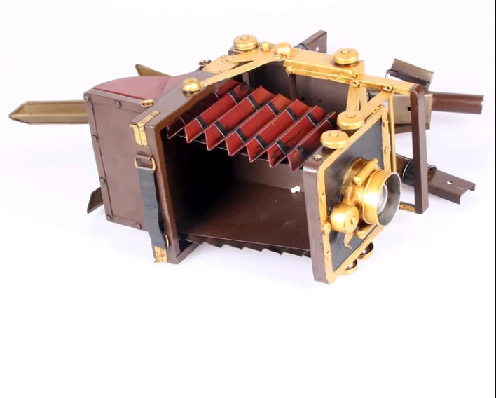 Vintage iron tripod camera model