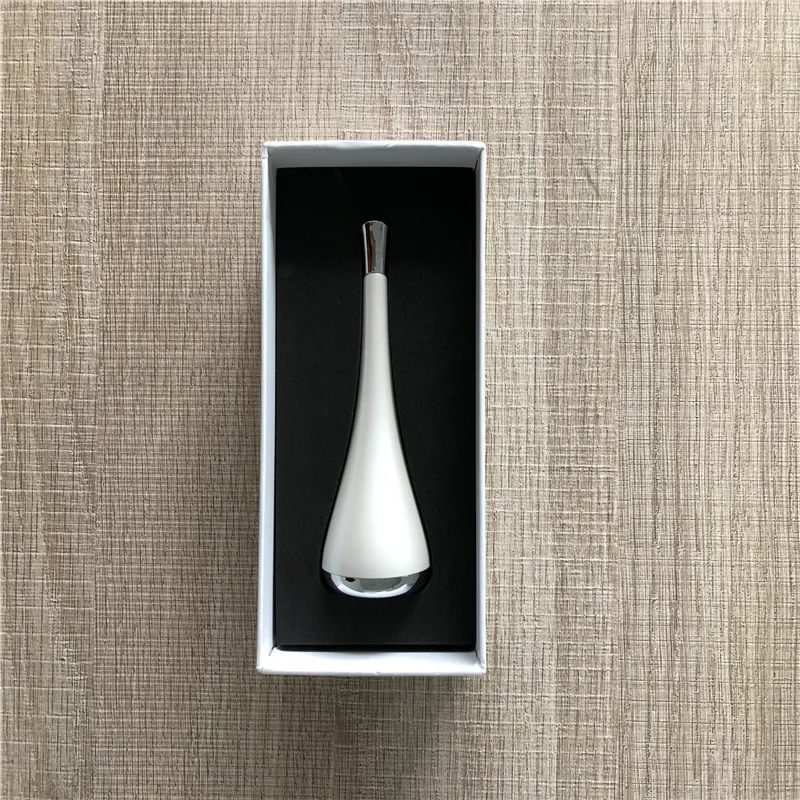 
Mini magnetic infuser touching vibration new shape beauty care multi-function personal care skin device M-1408 