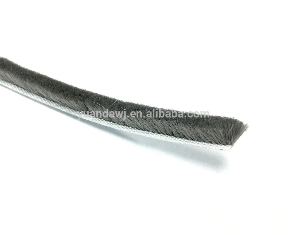 Wool pile weather seal strip door