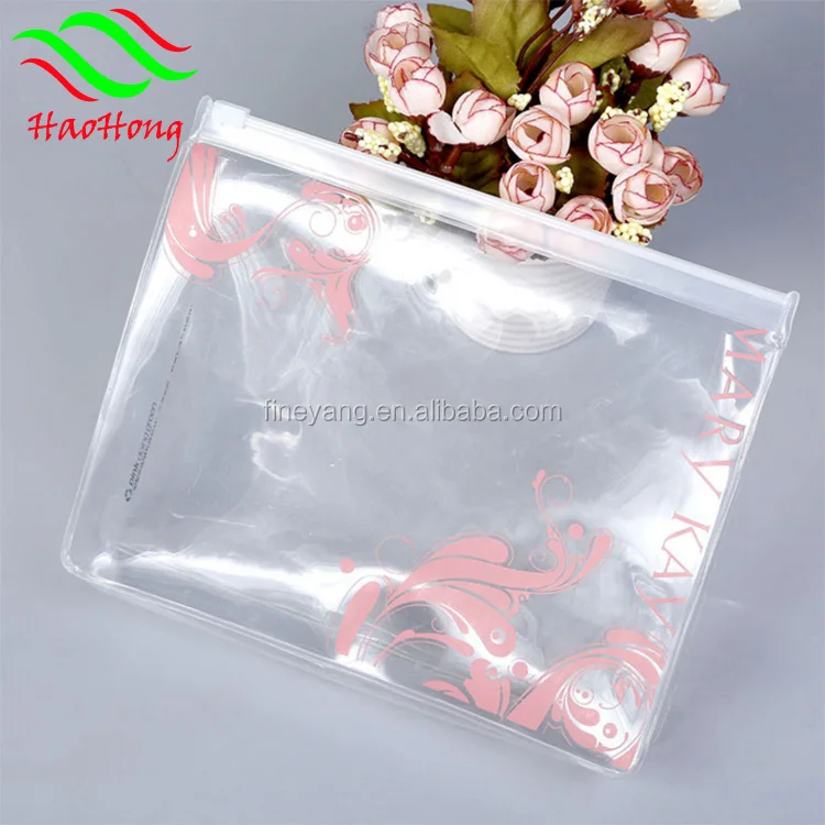Wholesale clear soft vinyl pvc cosmetic zipper pouch/Plastic standing pvc zipper pouch bag with tear notch for snack