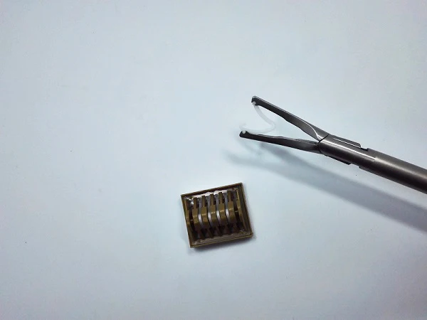 Surgical metal clip applicator for open and laparoscopic surgery