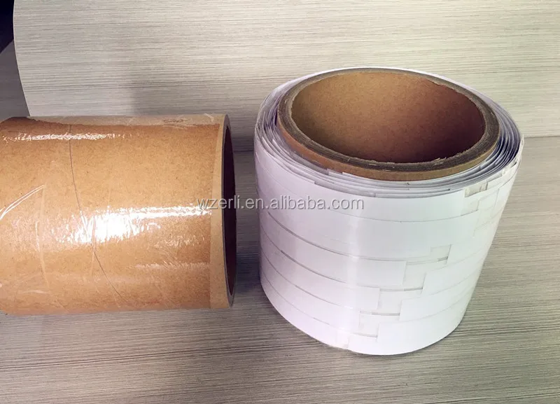 adhesive carry handle roll tape for multipacks used by the handle applicator
