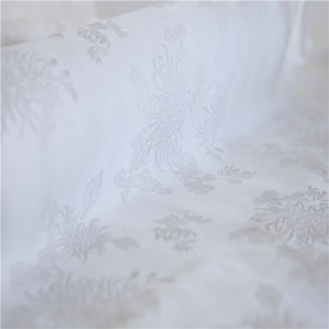 
China silk fabric supplier wholesale Marigold Fragrant Crepe 33% silk material white plain silk fabric 