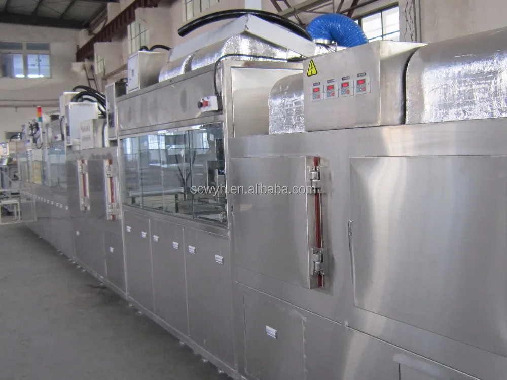 Automatic cleaning and hard coating machine for optical lens