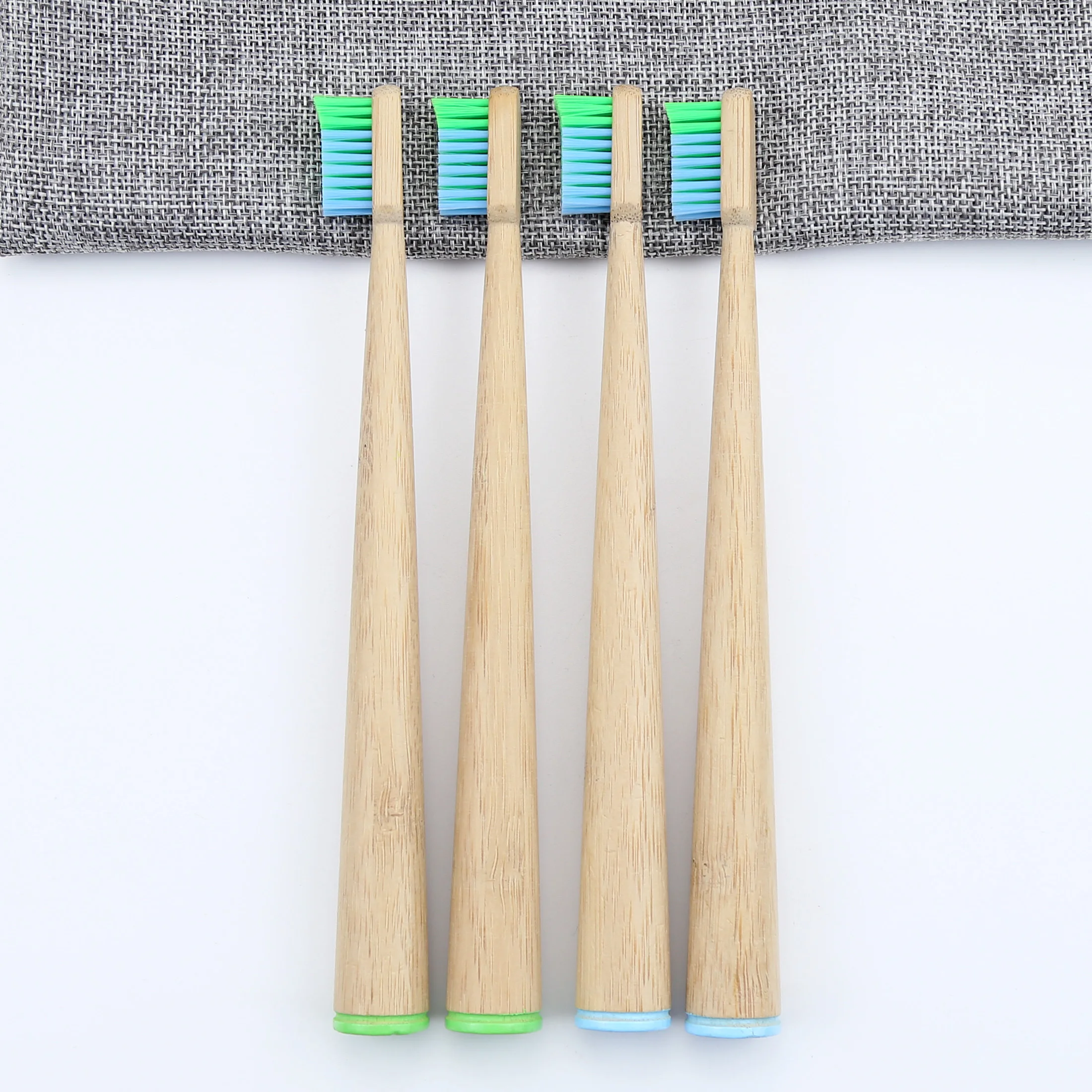 
conical handle biodegradable eco bamboo toothbrush with wavy end-rounded Dupont Nylon 612 super soft bristles 