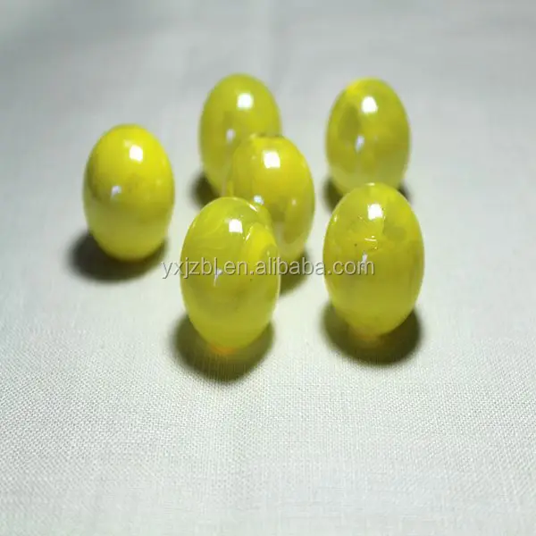 
Yellow colour transparent playing glass marbles for children 