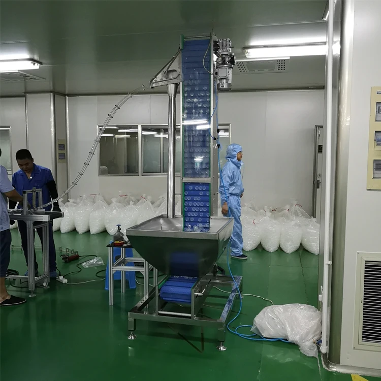 Full Automatic Vibratory Silicone Flower Cap Feeder Machine For Sale