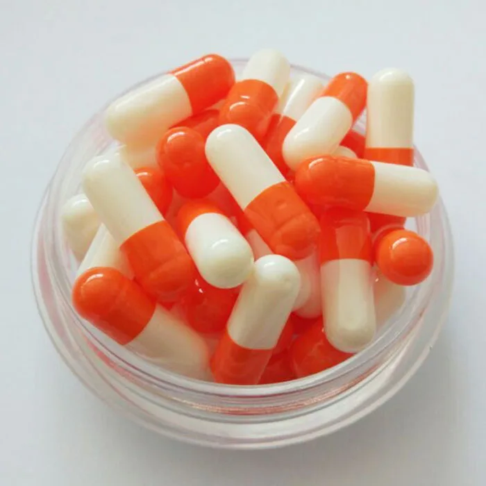 China bulk sale gelatin empty size 0 red and white capsule