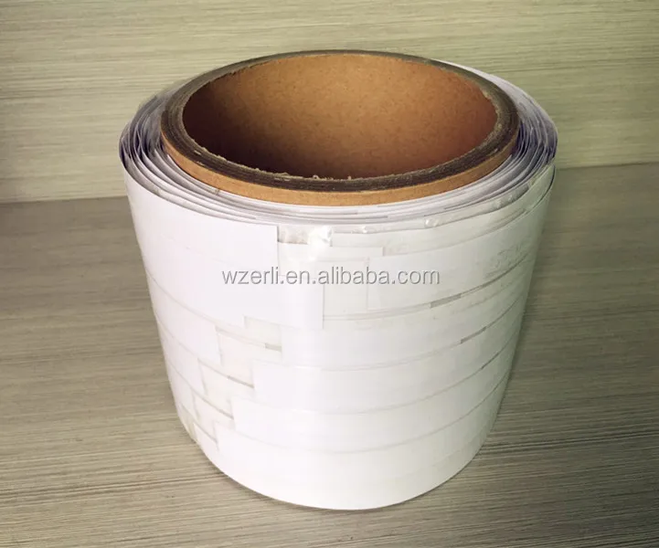 adhesive carry handle roll tape for multipacks used by the handle applicator