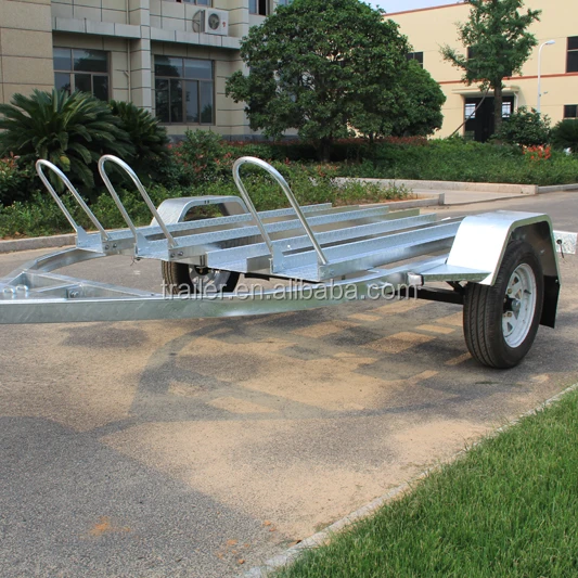 3 Motorcycles Transporting Trailer