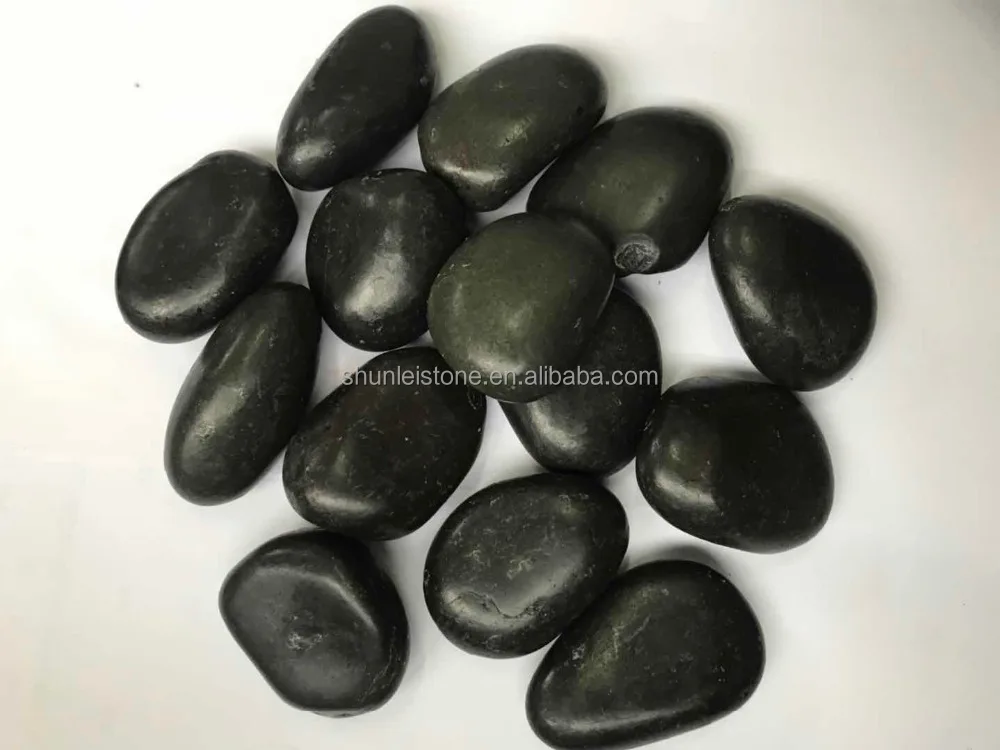 
polished black river pebble stone with wax 