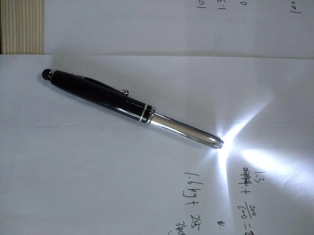 newst design hand spinner pen metal ballpoint pen with light/rotating pens