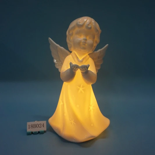 White porcelain angle figurine with light