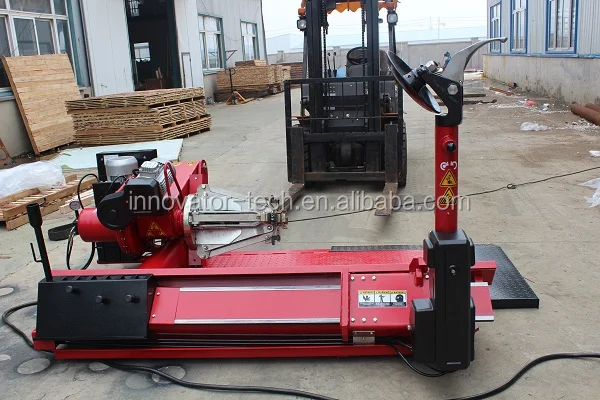 Full automatic heavy duty tire removal equipment for truck tire changing IT619S