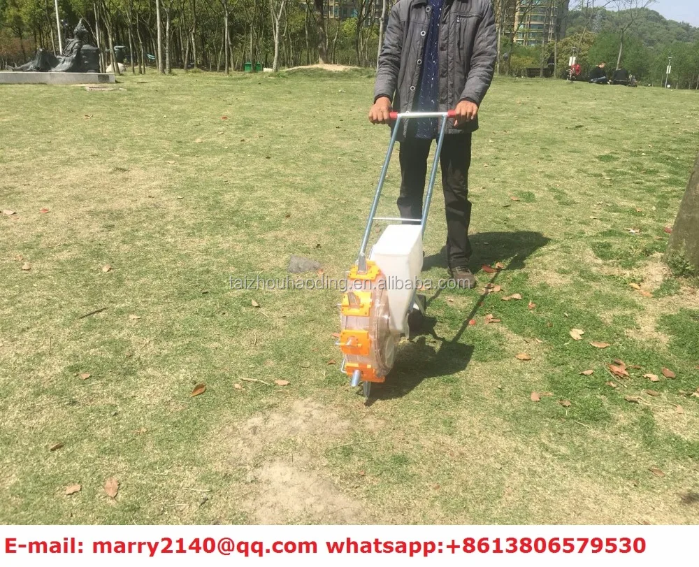 
Hand push manual carrot /taro /corn/ peanut /onion/ garlic seed seeder 