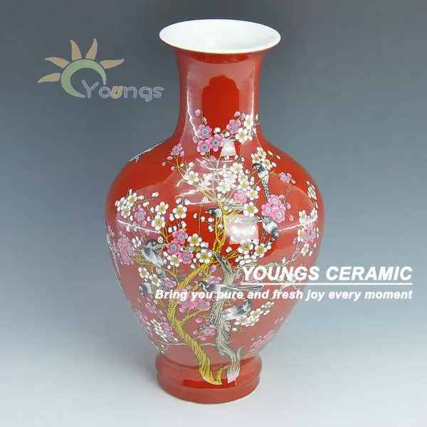 Chinese red vase with maskot pattern