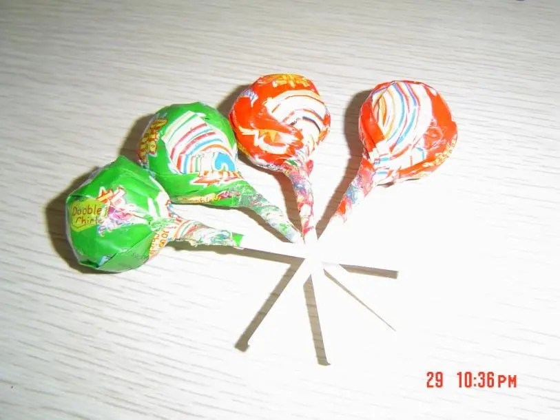 
Lollipop with gum inside colorful sweet candy 