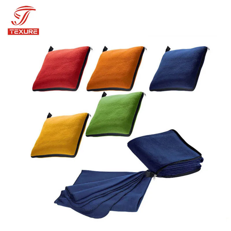 Hot sale promotional pillow style car,airplane,train fleece travel blanket with zipper bag