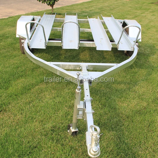 3 Motorcycles Transporting Trailer