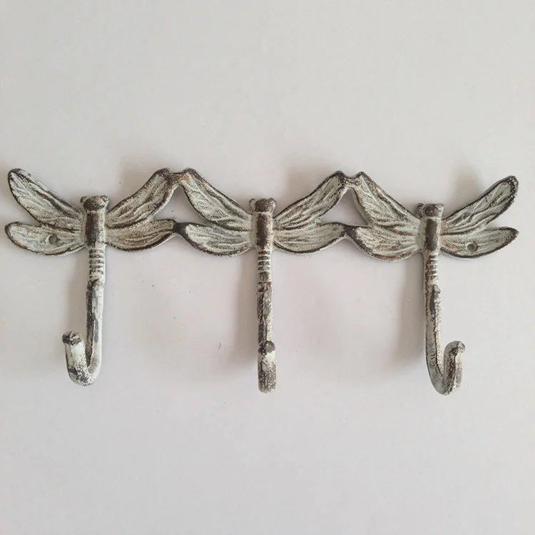 cast iron dragonfly concrete metal wall hooks