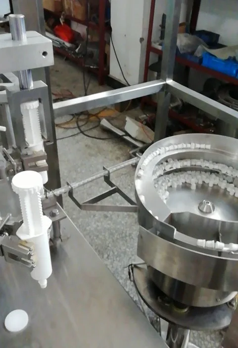 Fully automatic plastic pre filled  syringe filling and cap machine for different liquid, gel product