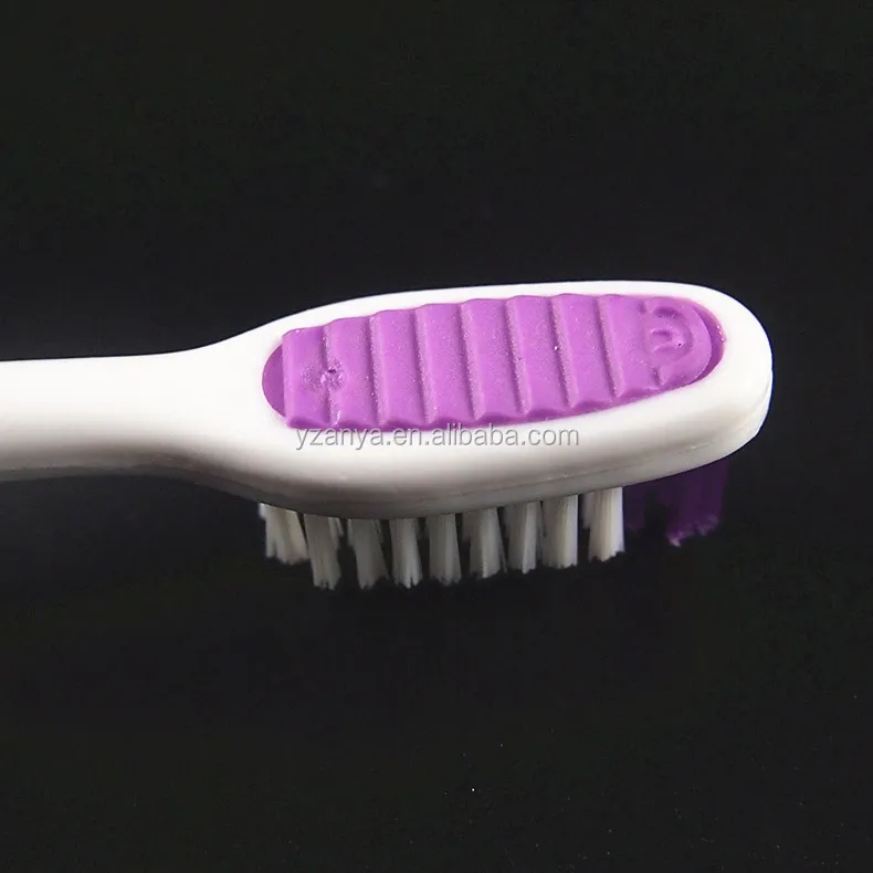 soft rubber handle adult toothbrush with tongue cleaner