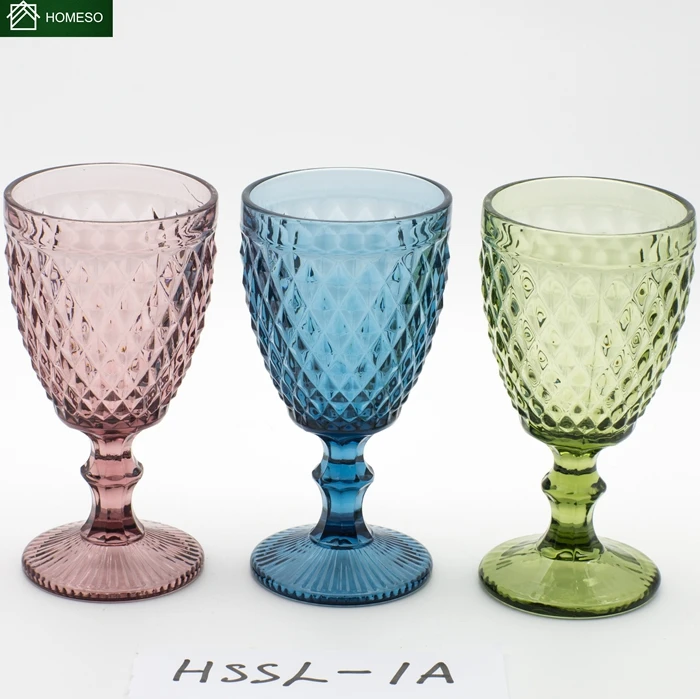 wine colored glass goblet with embossed