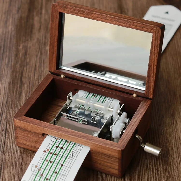 Battery operated hand crank 30 note music box paper with metal punch