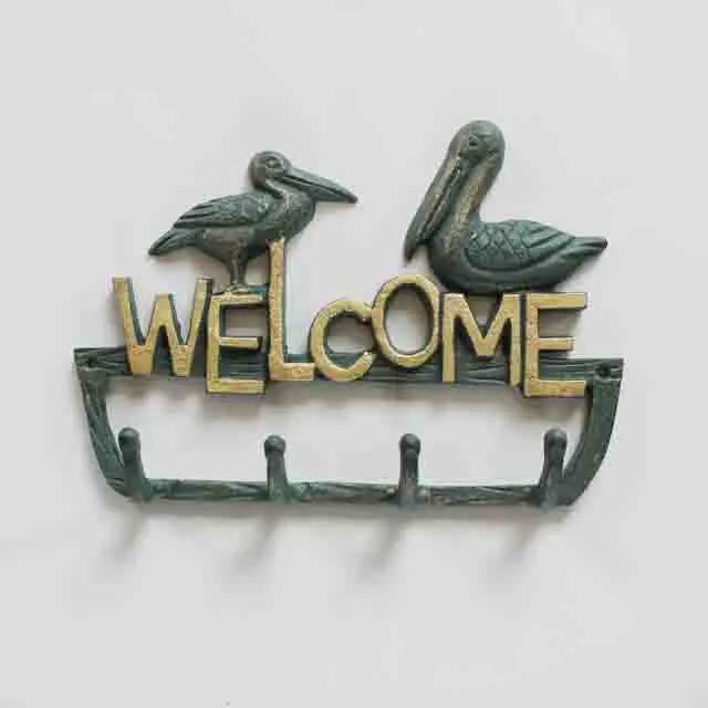 Cast iron pelican decorative wall mounted birds hooks