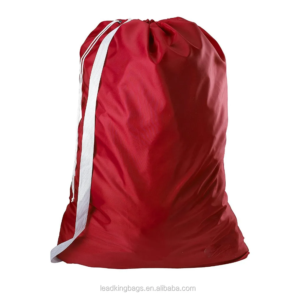 Nylon drawstring laundry bag with shoulder strap for heavy duty use popular among family and college apartment