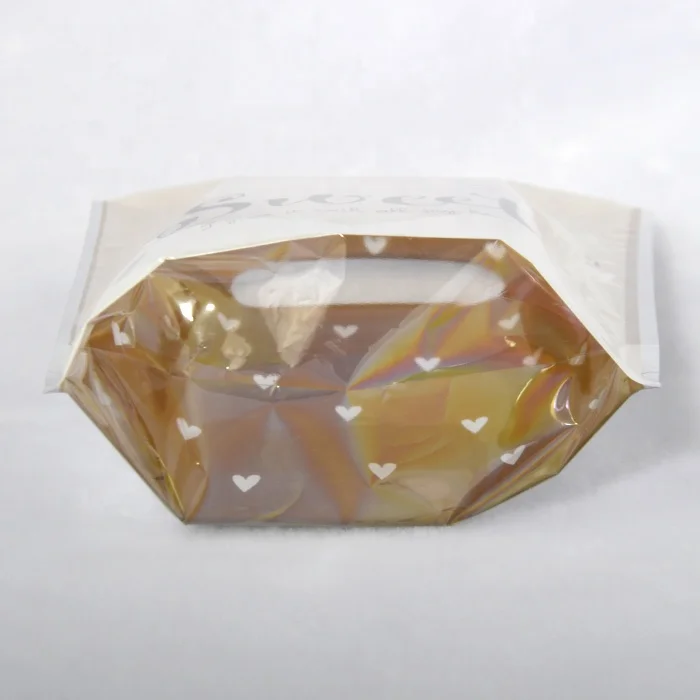 Custom cosmetic pouch die cut gold foil gift silver back handle plastic bag with bottom gusset metallic reusable shopping bag