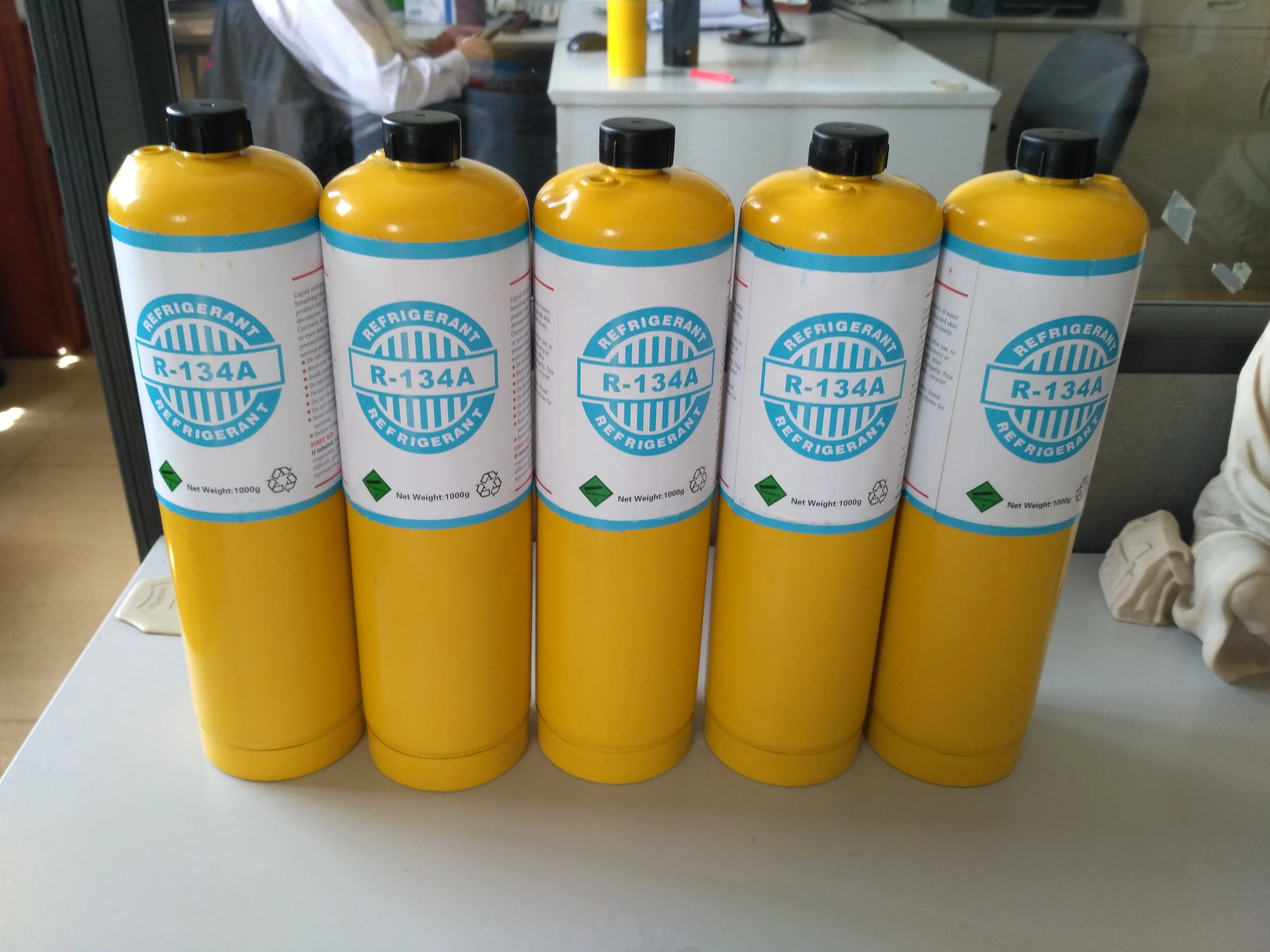 
Hot selling 1kg gas filling weight refrigerant r134a in brazed steel cylinder 99.9% purity prefilled refrigerant R134a for sale 