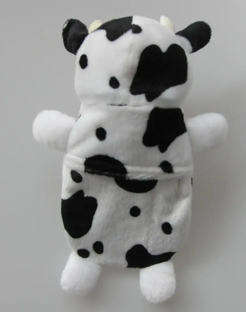 
black and white plush cow hot water bottle cover for children in Christmas Day 