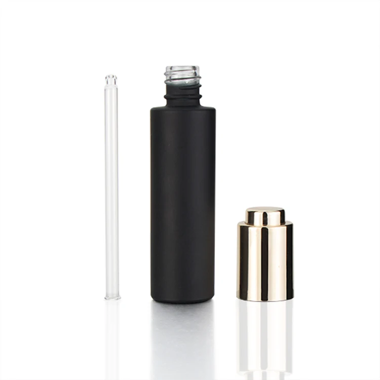 
Fancy label 30ml push button pump black thick cylinder glass cosmetic dropper packaging bottle with dropper or press pump 
