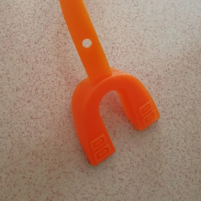 Strap mouth guard/gum shields for all contact sports