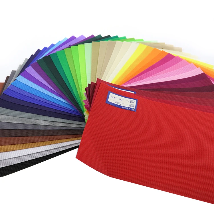 Colorful non woven cloth pp spunbond nonwoven fabric for bags making china manufacturer