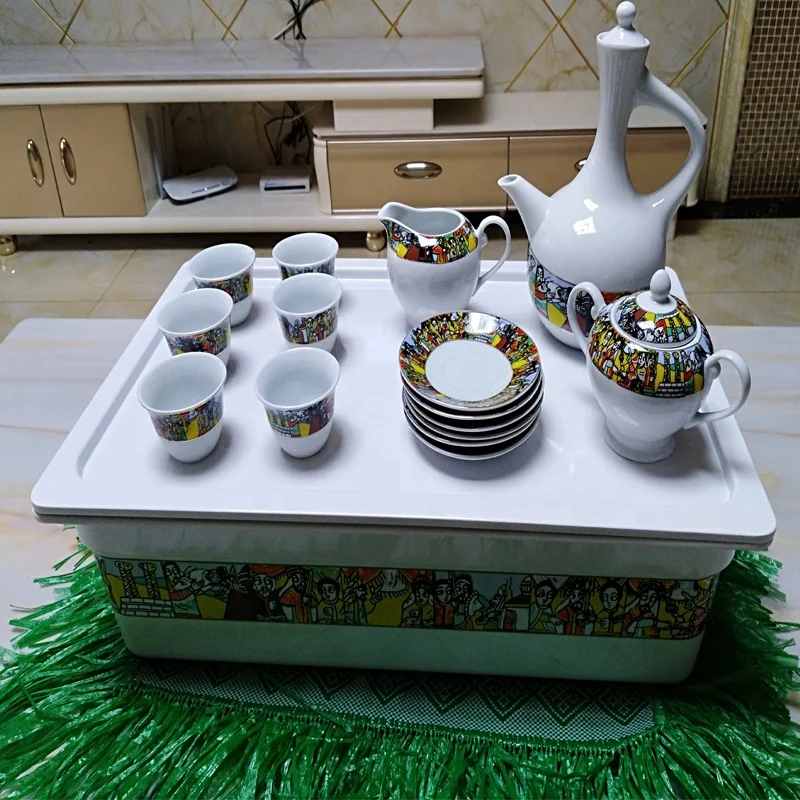 Coffee tray of rekebot for Ethiopian Eritrean Coffee ceremony with saba and tilet designs