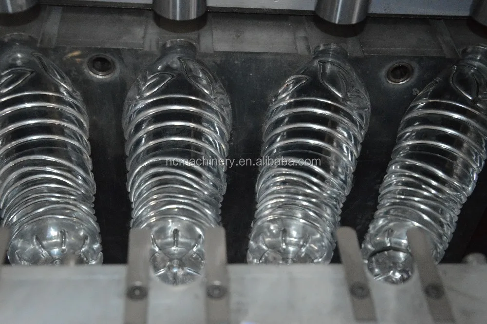 Auto Dropping Semi Automatic 4 Cavity Soda Water Bottle Blow Molding Machine