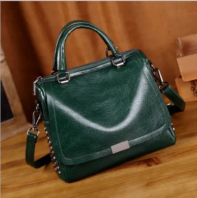 generation of handbags new European and American Boston pillow bag retro fashion handbag rivet Messenger shoulder bag