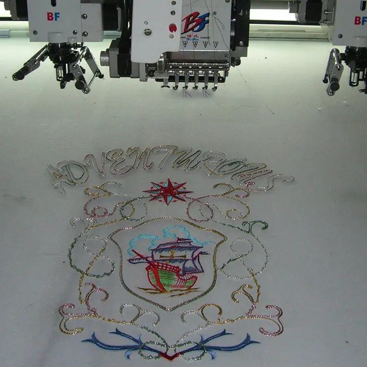Industrial computerized embroidery machine with accessories