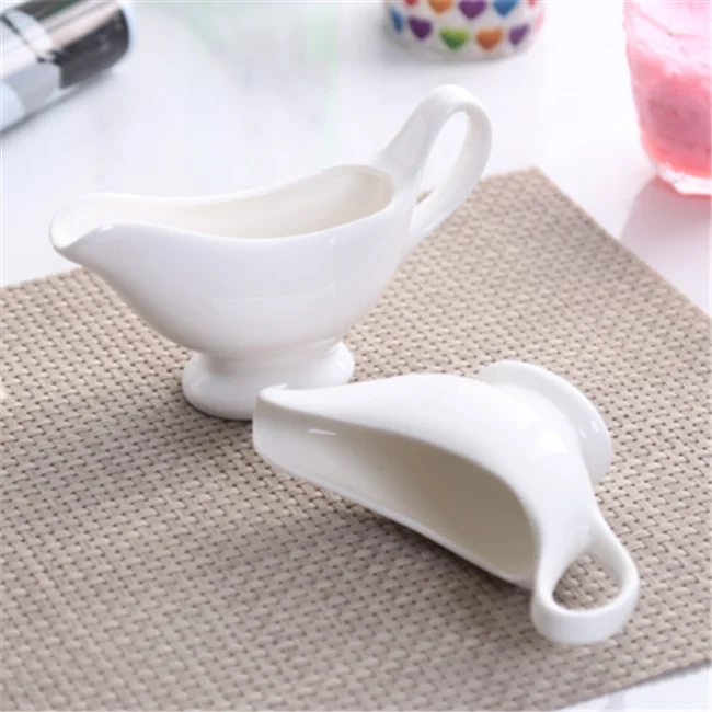 
China suppliers ceramic creamer pot,gravy boat,White Honeycomb Gravy Boat For Sauce Service 